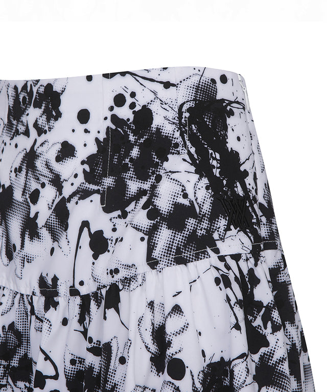 ANEW Golf Women Shirring DTP Point Flare Skirt in White with floral pattern and flared hem design.